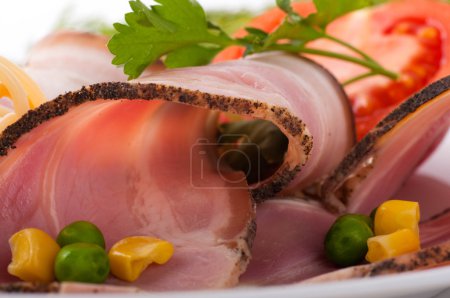 Bacon and boiled pork with peas and tomatoes