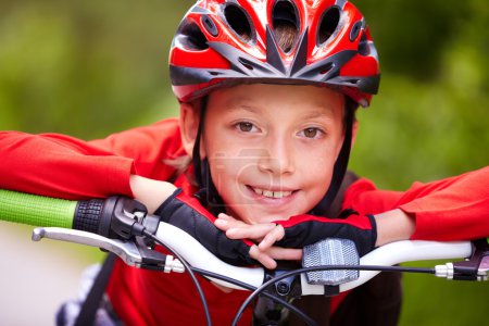 Little boy's face on bike