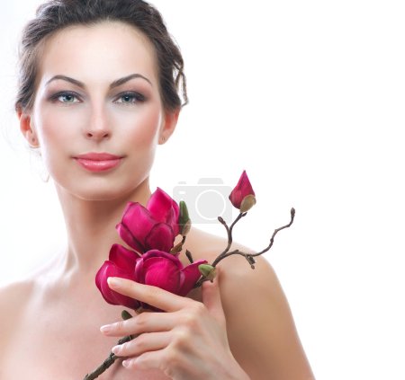 Beautiful Healthy Woman with Spring Flowers. Spa